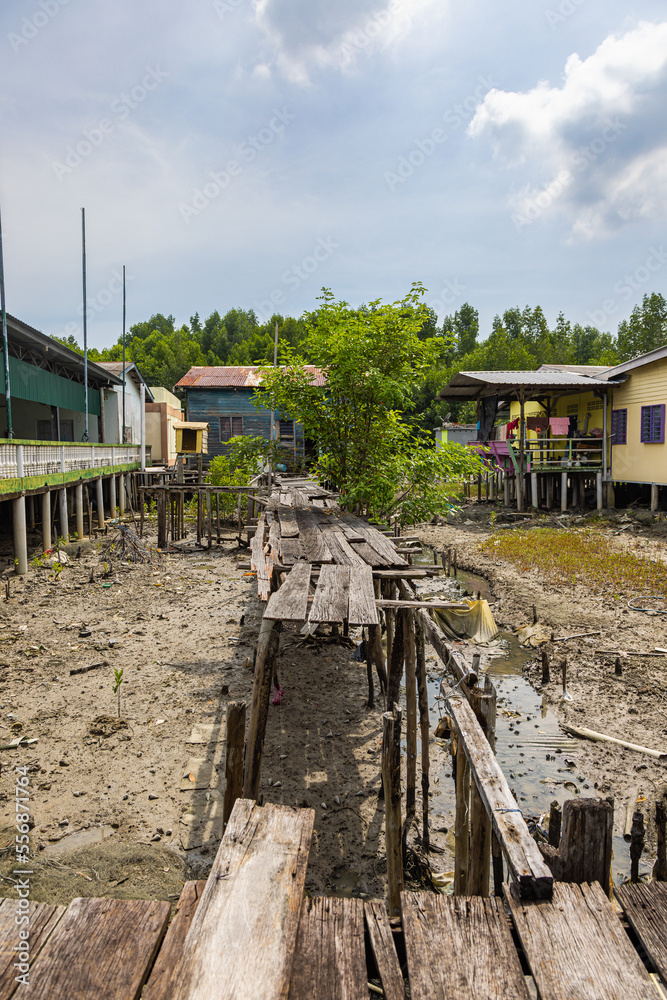 Pulau Ketam, Malaysia - December 26, 2022: Pulau Ketam, translated, crab island, A small island located off the coast of Klang. Fisherman village built on stilts on the shore of the island. Pulau Ketam, Malaysia - December 26, 2022: Pulau Ketam, translated, crab island, A small island located off the coast of Klang. Fisherman village built on stilts on the shore of the island.