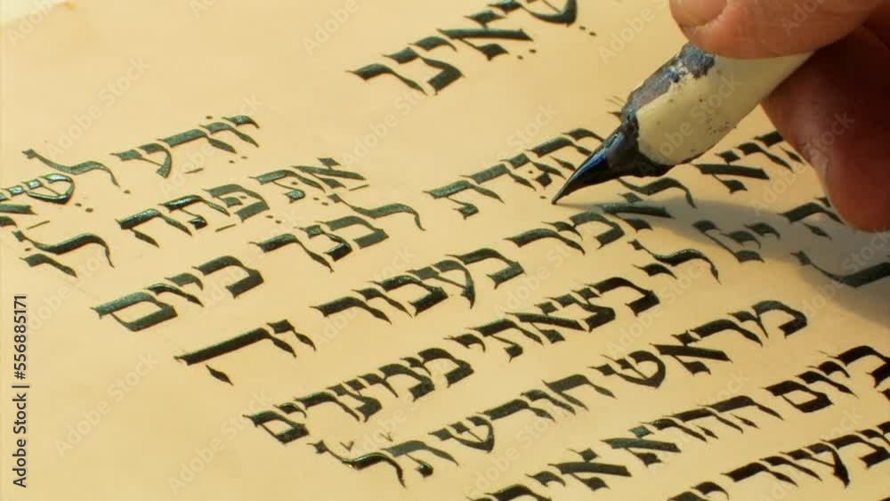 Sofer writes a Hebrew Passover Hagada, Close up
a Jewish text that sets forth the order of the Passover Seder, Israel, 2022 
