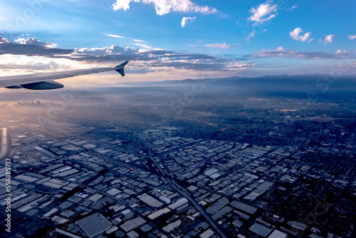 flying over city of los angeles at sunset