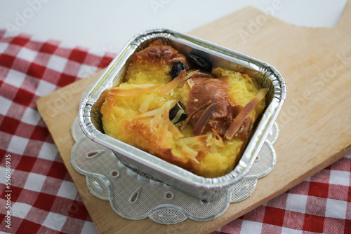 Bread Pudding Served on Wooden Board  photo