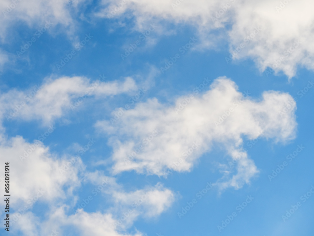 Fototapeta premium Light soft clouds against a blue sky