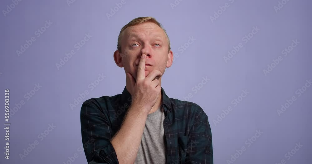Young man thinking solving problem, studio shot Young man thinking solving problem, studio shot