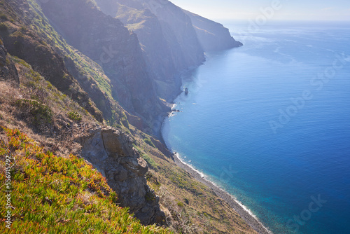 Landscape view with cliffs and ocean in Ponta Do Pargo, west of Madeira island, Portugal. Sunny day.