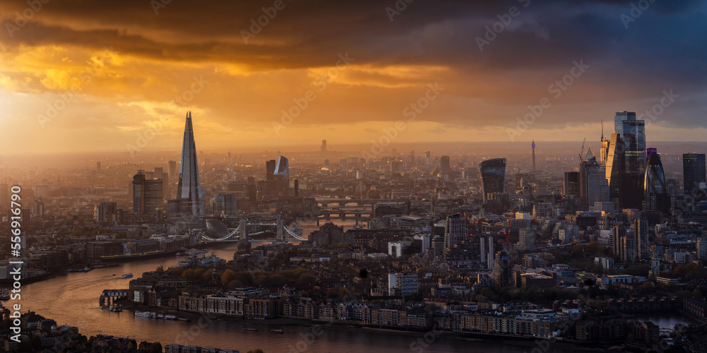 Panorama of the London skyline from Westminster until the City skyscrapers during a cloudy sunset, United Kingdom 