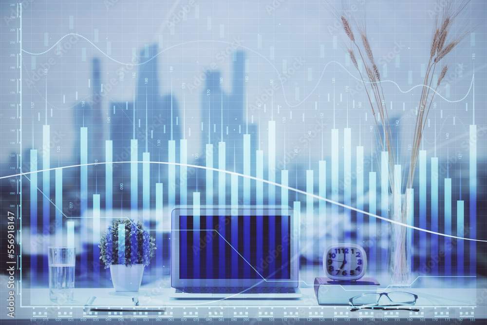 Stock market graph and table with computer background. Double exposure. Concept of financial analysis. Stock market graph and table with computer background. Double exposure. Concept of financial analysis.