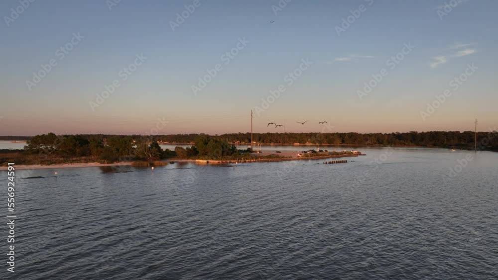 Pelican Point at sunset near Weeks Bay, Alabama Pelican Point at sunset near Weeks Bay, Alabama