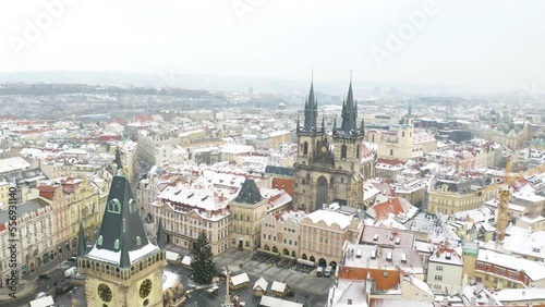 Wallpaper Mural Aerial Pullback Reveals Prague's Old Town Square in Winter with Christmas Market. Snow Torontodigital.ca