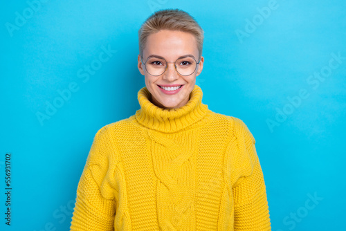 Photo of stunning lovely lady wear yellow winter jumper buy glasses nice stylish accessory isolated on blue color background