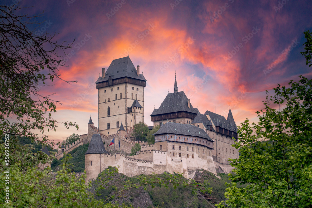 Karlstejn castle with nice burned sky Karlstejn castle with nice burned sky