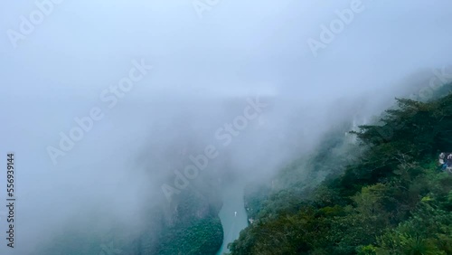 shot from a viewpoint of the sumidero canyon with intense fog photo