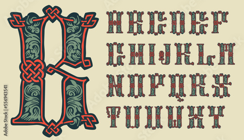 Alphabet set in medieval knots lines style. Dim colored drop cap. Engraved barbarian emblem.