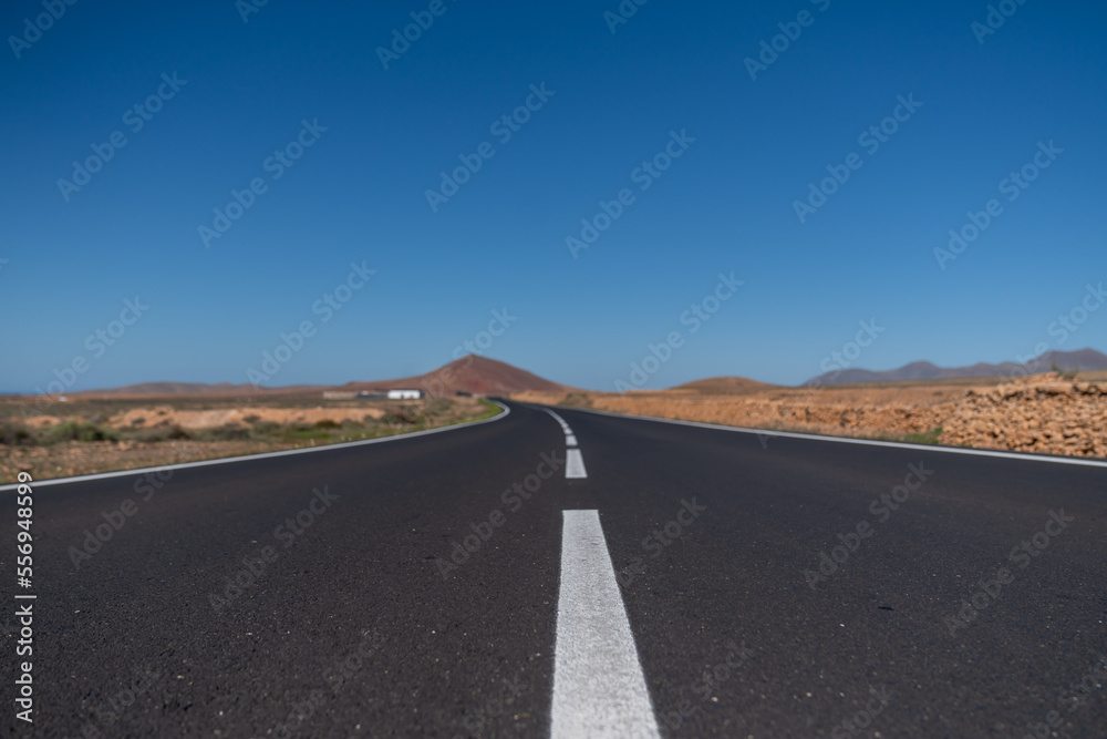 road in the desert of Islas Canarias - Fuerteventra island road in the desert of Islas Canarias - Fuerteventra island