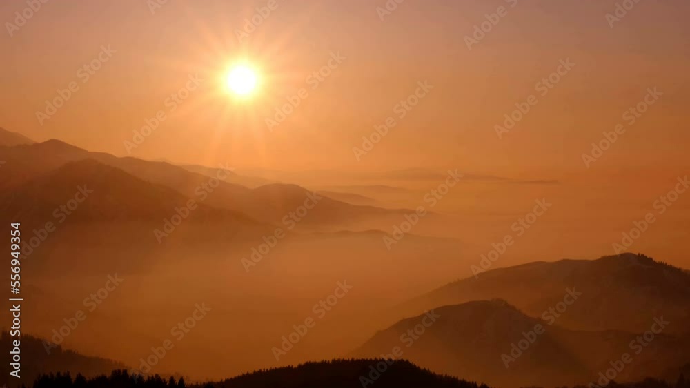 Magical atmosphere of a mountain valley at sunset; magical rays of the setting sun over the mountain ridges Magical atmosphere of a mountain valley at sunset; magical rays of the setting sun over the mountain ridges