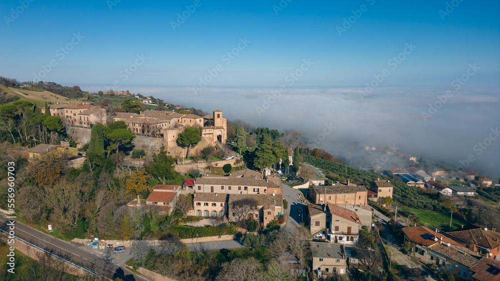 Italy, December 2022: aerial view of the beautiful medieval village of Montegridolfo in the province of Rimini in the Emilia Romagna region bordering the Marche region