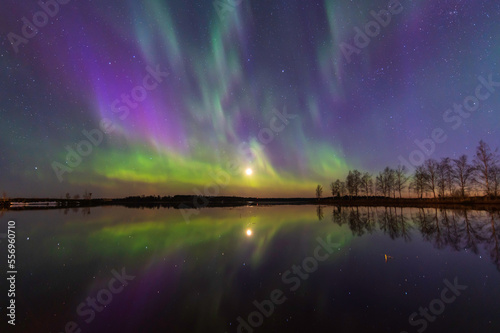 Northern lights reflected in the sea. Nykarleby Uusikaarlepyy. Finland