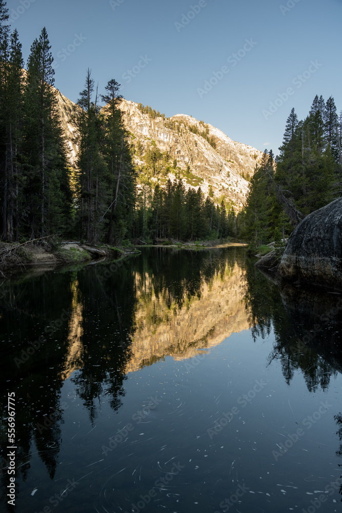 Mountains Reflect In The Slow Moving Waters of The Tuolumne River Mountains Reflect In The Slow Moving Waters of The Tuolumne River