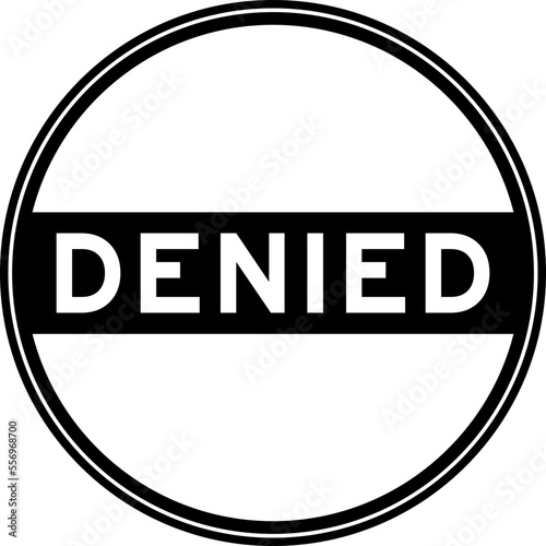 Black color round seal sticker in word denied on white background