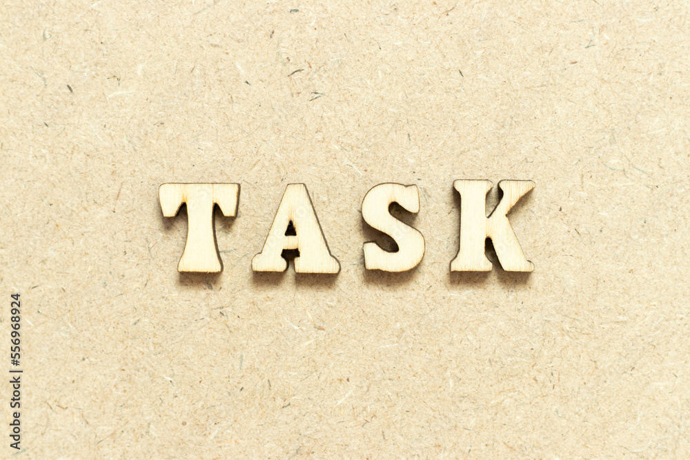 Alphabet letter in word task on wood background Alphabet letter in word task on wood background