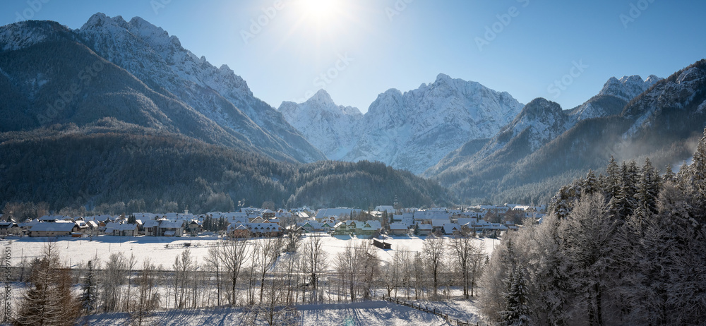 Φωτογραφία Kranjska Gora in Slovenia covered in snow at winter with Julian Alps and Triglav