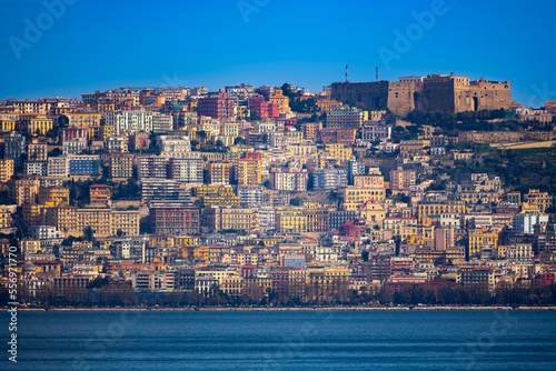 Distant view of buildings of Naples waterfront, Italy 