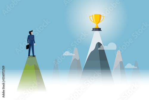 Businessman standing on a high mountain looking growth modern ideas And to achieve higher