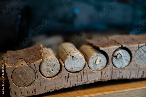 Traditional way of making cork stoppers for wine bottles from cork oak tree