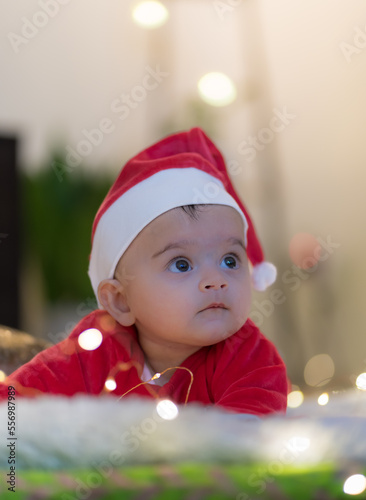 baby in santa claus hat