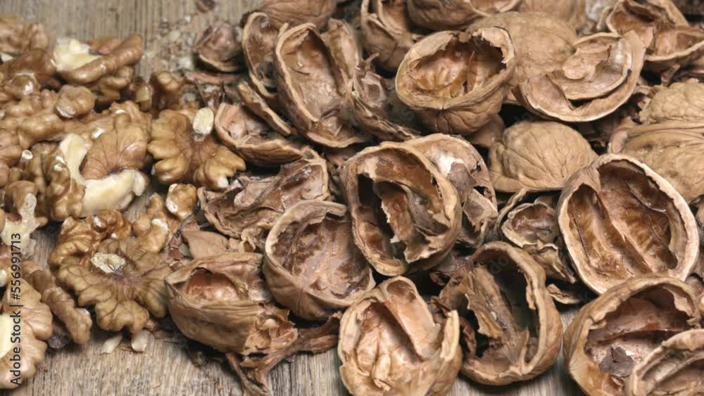 close up of dried fruits, walnut and open nutshell, horizontal motion, 4k resolution close up of dried fruits, walnut and open nutshell, horizontal motion, 4k resolution