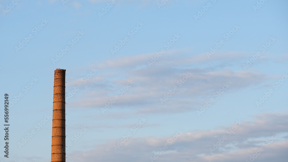 industrial brick chimney in front of sky, Germany, Berlin