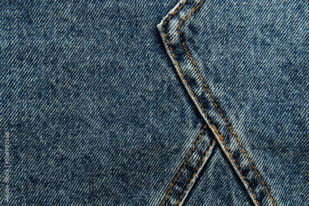 Line on jeans. Denim texture with fine stitching Line on jeans. Denim texture with fine stitching