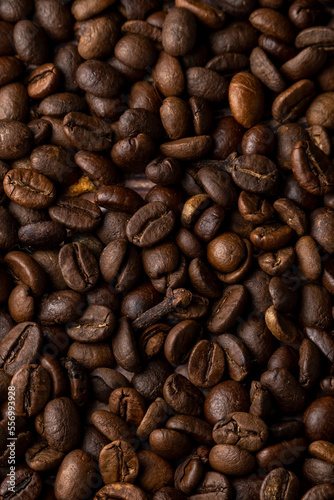 Roasted coffee beans background. Healthy beverage ingredients