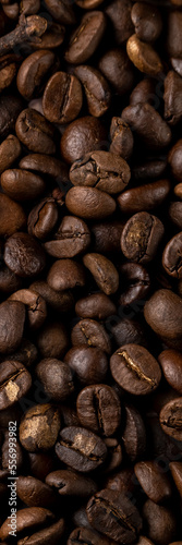 Roasted coffee beans background. Healthy beverage ingredients