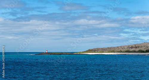 Point Carola Beach with lighthouse near Puerto Baquerizo Moreno, Galapagos national park, Ecuador. photo