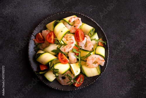 Delisicous fresh seafood salad with shrimps and zucchini