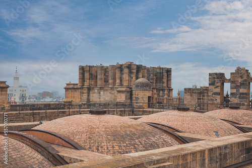 Panorama of Malaga city center and seaport  from the roof of La Manquita Cathedral. La Manquita Cathedral roof tour. Amazing view, blue sky above. Andalusia, Spain photo