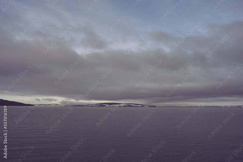 View of Helgøya Island in Lake Mjøsa at winter. View of Helgøya Island in Lake Mjøsa at winter.