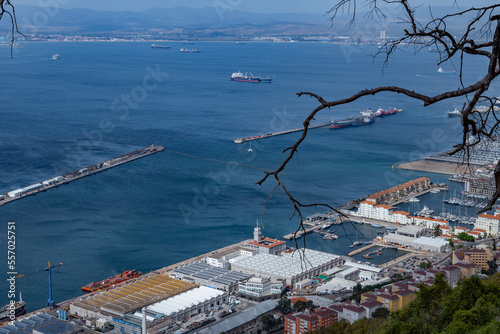 View from the Rock of Gibraltar to the bay of Gibraltar full of ships on the roadstead and The Port of Algeciras. Incredible skyline, blue sky with amazing clouds. Gibraltar, UK