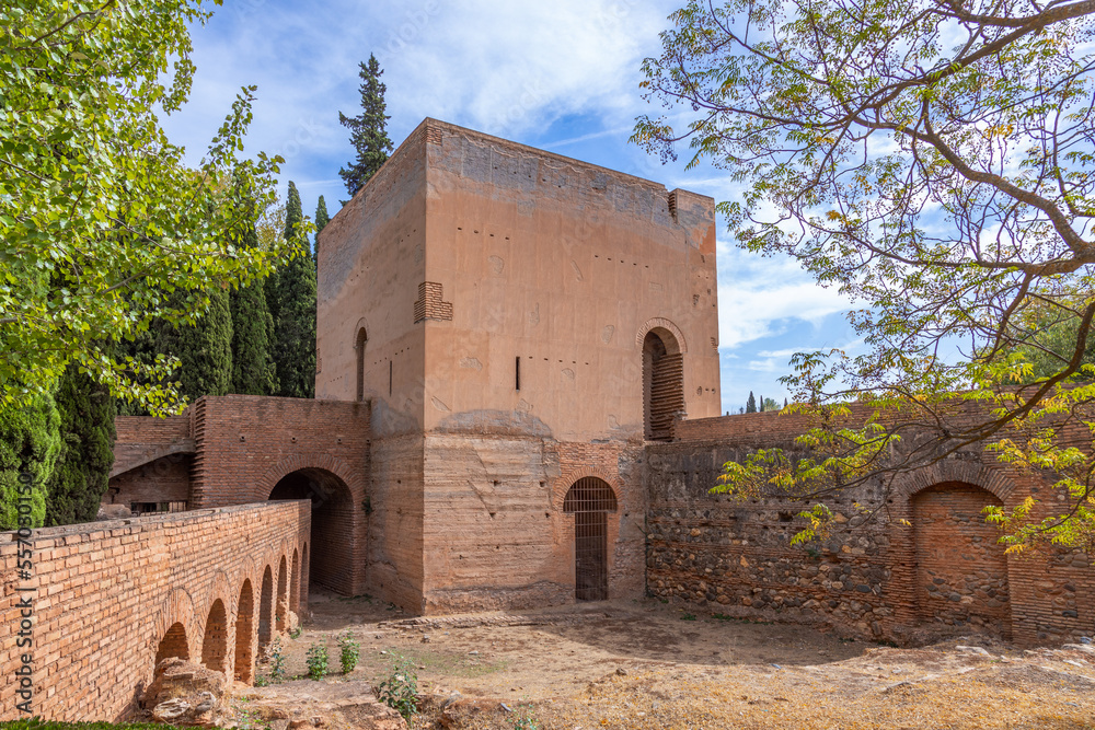 Alhambra de Granada. Palace and fortress of Granada. Ramparts, interiors, buildings, towers, courtyards of a medieval fortress in the Arab, Moorish style. Alhambra de Granada. Palace and fortress of Granada. Ramparts, interiors, buildings, towers, courtyards of a medieval fortress in the Arab, Moorish style.