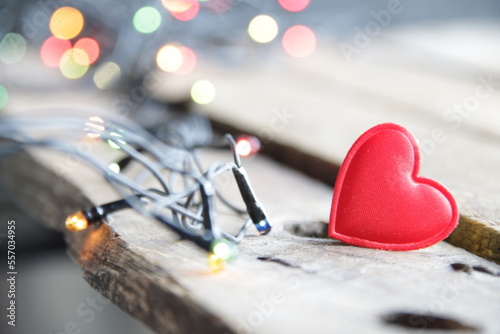 Merry Christmas card. Christmas garland close up and heart. © Markgraf Ave