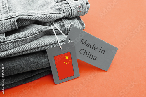 Detail of blue jeans, label and Made in China lettering.