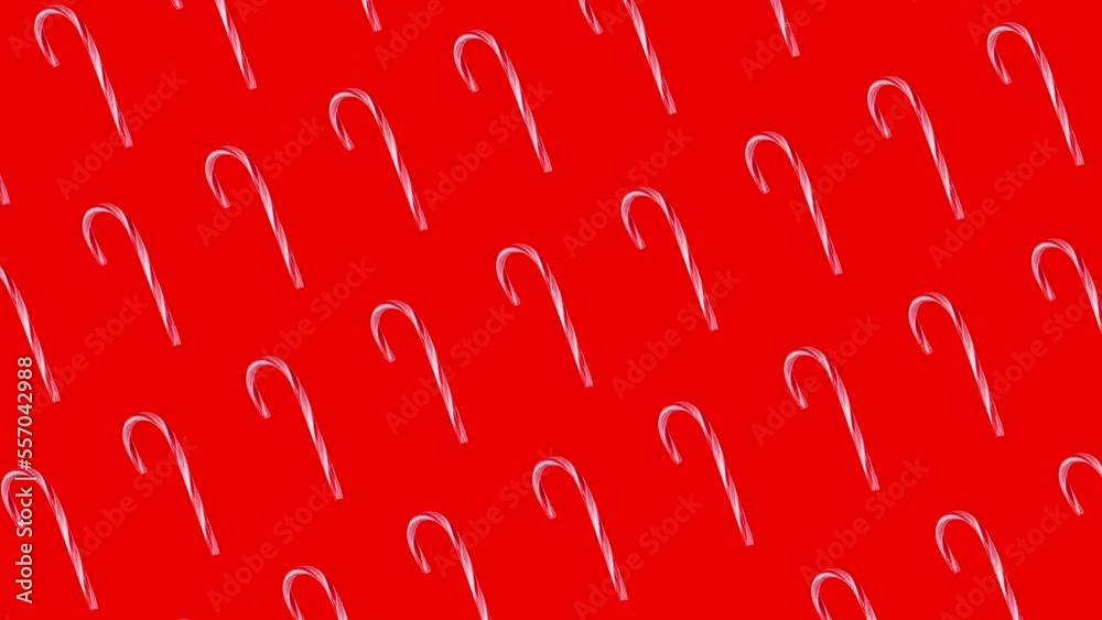 looped christmas animation with candy cane on red background, new year concept.