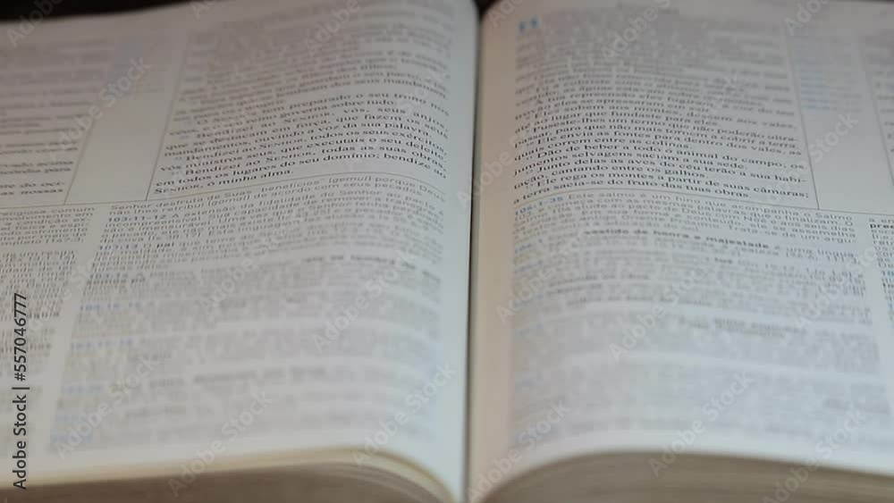 Bible open on a pulpit turning pages Bible open on a pulpit turning pages