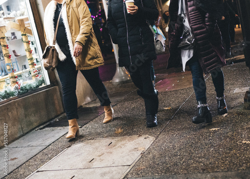 Photography Three anonymous women walking at night