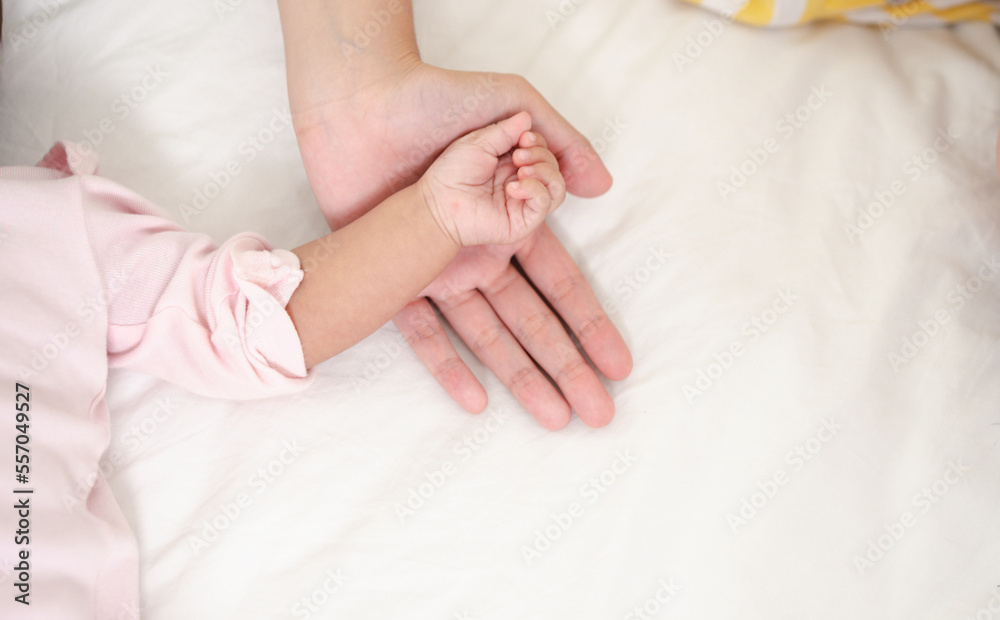 Mother Parenting and newborn birth life. Mom and baby boy playing in sunny bedroom, Family having fun together. childcare, maternity concept. Mother Parenting and newborn birth life. Mom and baby boy playing in sunny bedroom, Family having fun together. childcare, maternity concept.