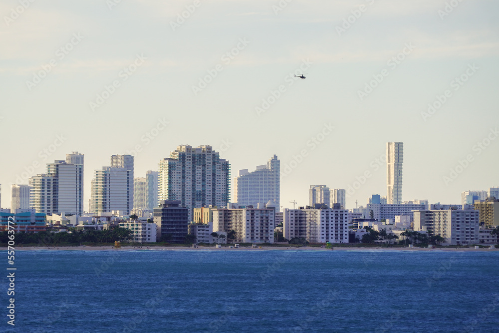 Fototapeta premium Beautiful aerial panoramic view of the city of Miami, its buildings, marina, yachts and luxurious suburbs houses