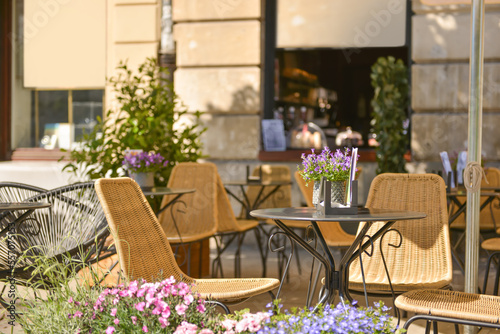 Outdoor cafe with beautiful flowers and comfortable furniture © New Africa
