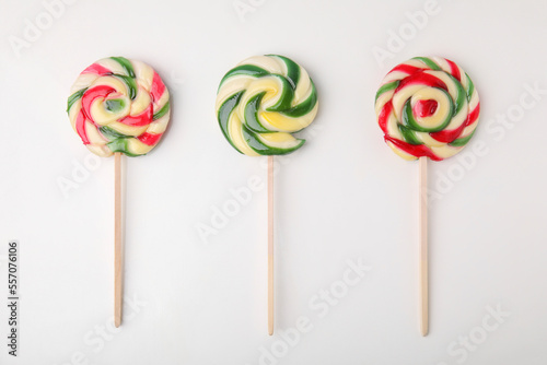 Wallpaper Mural Colorful lollipops on white background, flat lay Torontodigital.ca
