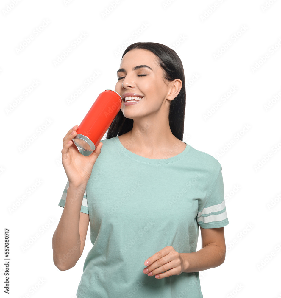 Beautiful happy woman holding red beverage can on white background Beautiful happy woman holding red beverage can on white background