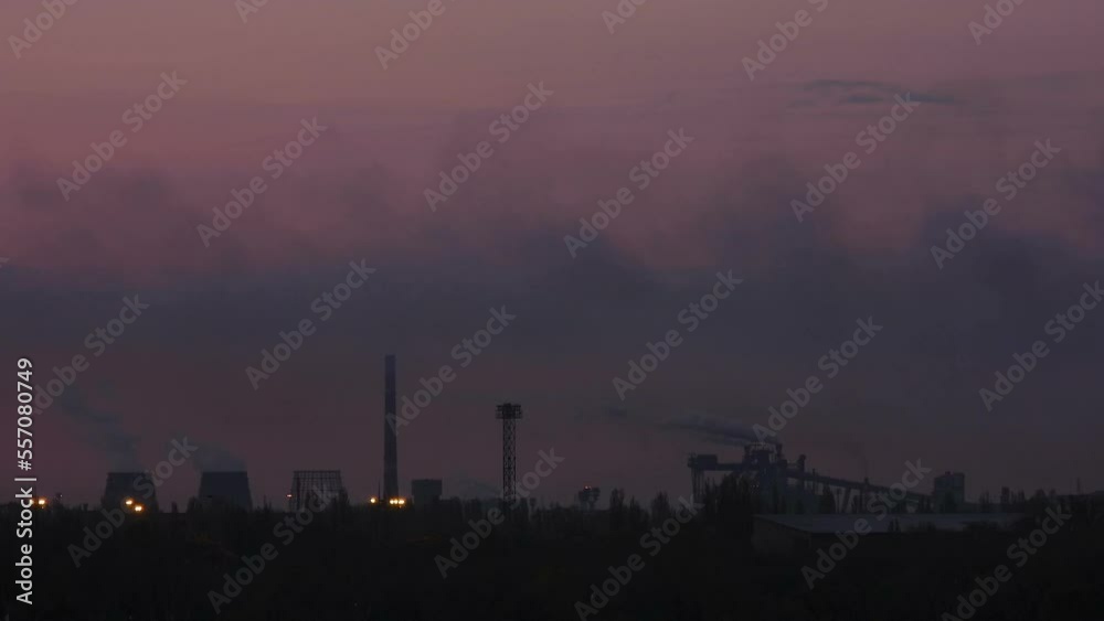 The cause of global warming. Chimneys background. The greenhouse effect. Poisoned air. Epic pollution of nature. Toxic substances. Metallurgical industrial factory. Smoking chimneys at dark dawn. The cause of global warming. Chimneys background. The greenhouse effect. Poisoned air. Epic pollution of nature. Toxic substances. Metallurgical industrial factory. Smoking chimneys at dark dawn.