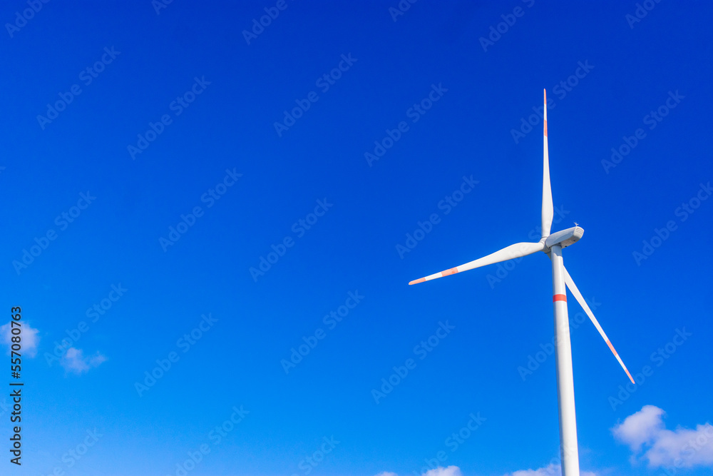 windmill in a sunshine day. Concept of alternative energy wind turbines horizontal at the south coast windmill in a sunshine day. Concept of alternative energy wind turbines horizontal at the south coast